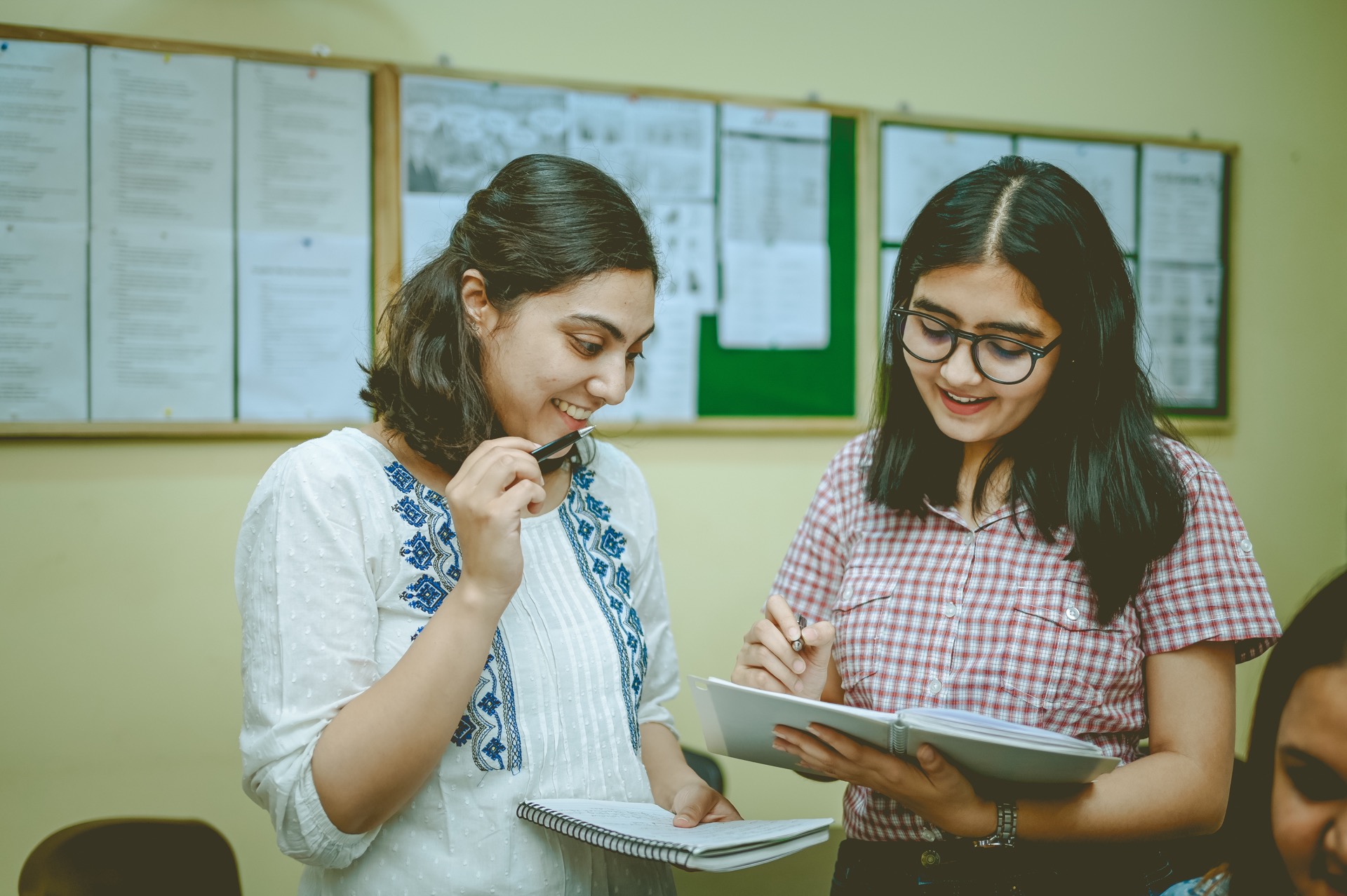 Students reviewing notes together